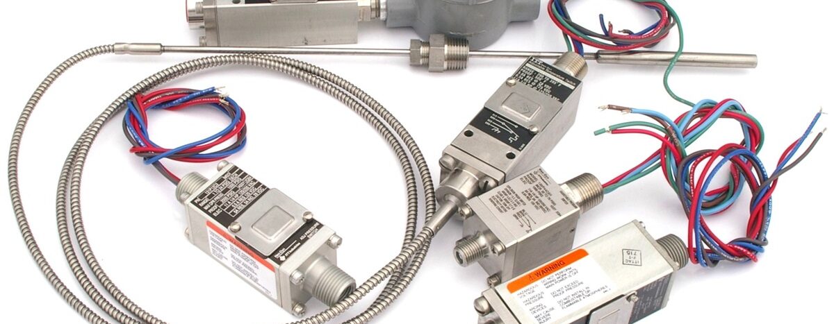 Water pump pressure control switch replacement parts: various pressure switches, wiring, and metal tubing on a white background.