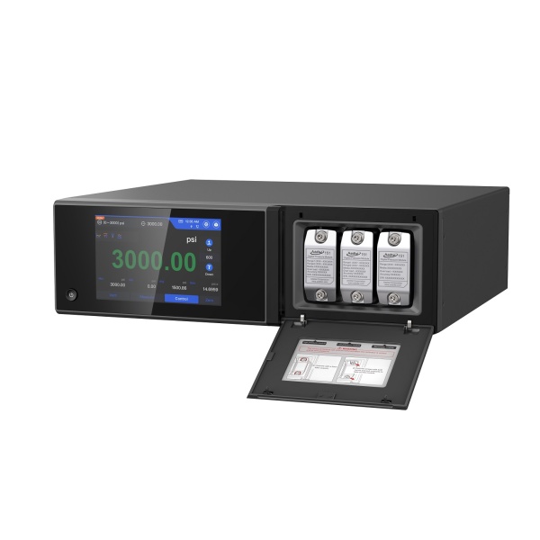 Digital pressure calibrator with modules. The calibrator has a screen displaying 3000 psi. The module bay door is open, revealing three modules.